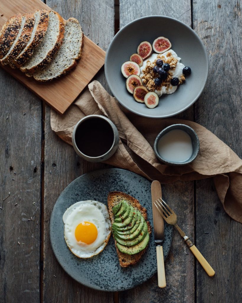 served healthy breakfast on wooden table